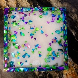 Resin coaster with crushed seashells